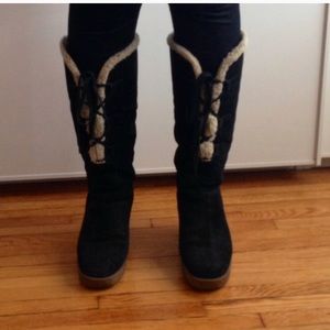 Michael Kors visibly preowned sherling boots.